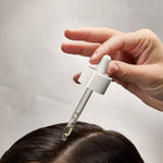 pipette sur cuir chevelu